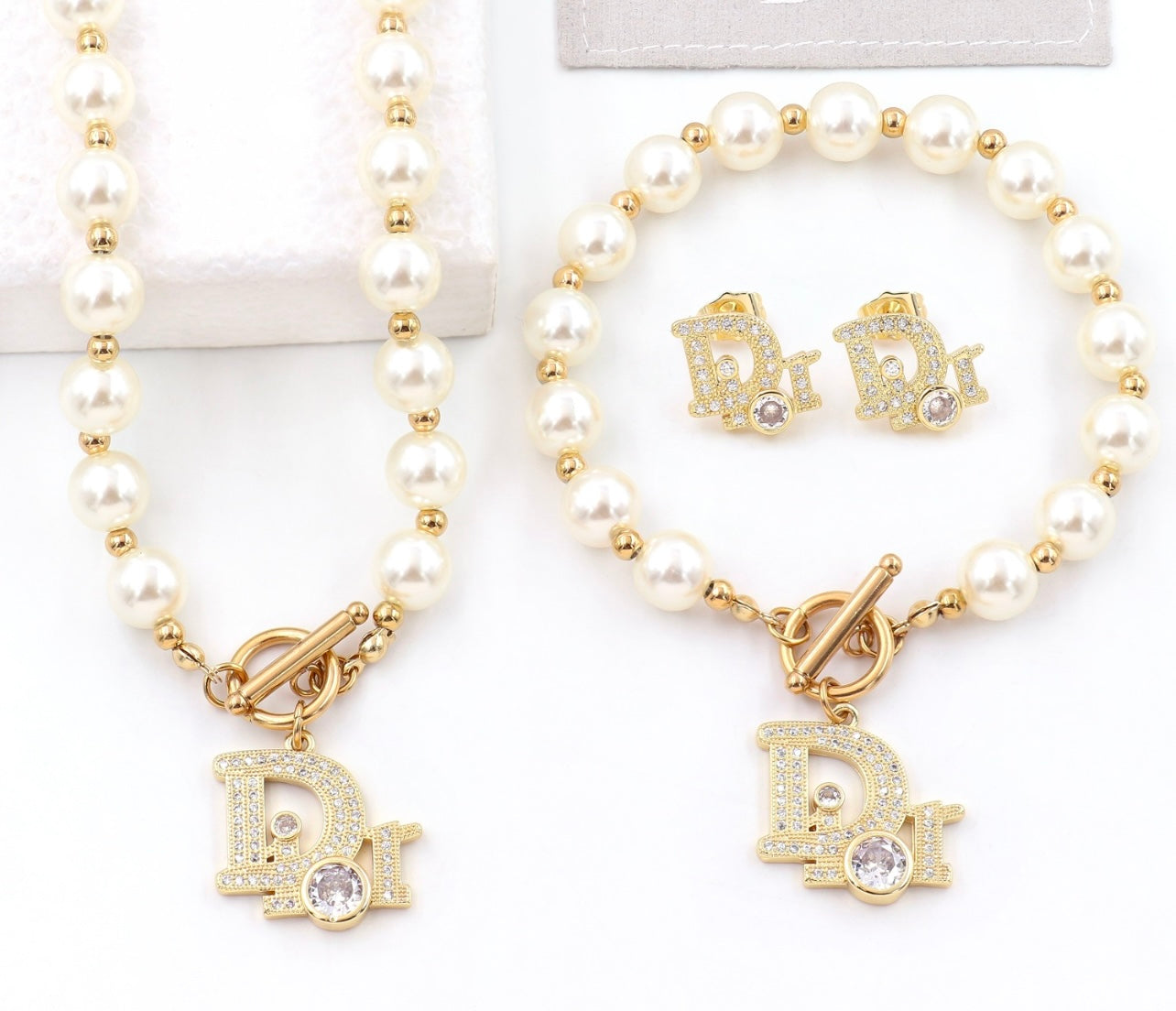 The D Pearl Necklace,Earings and Bracelet set